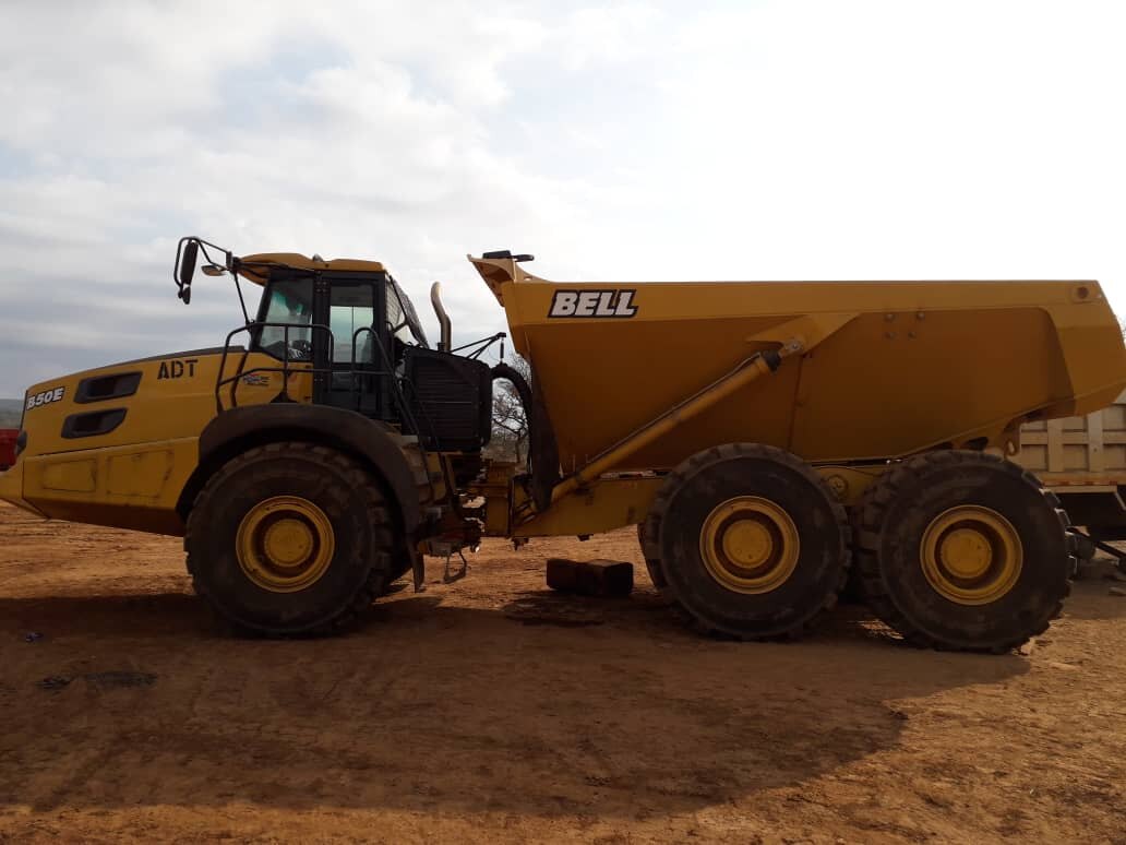 Articulated dump truck working at a mining site