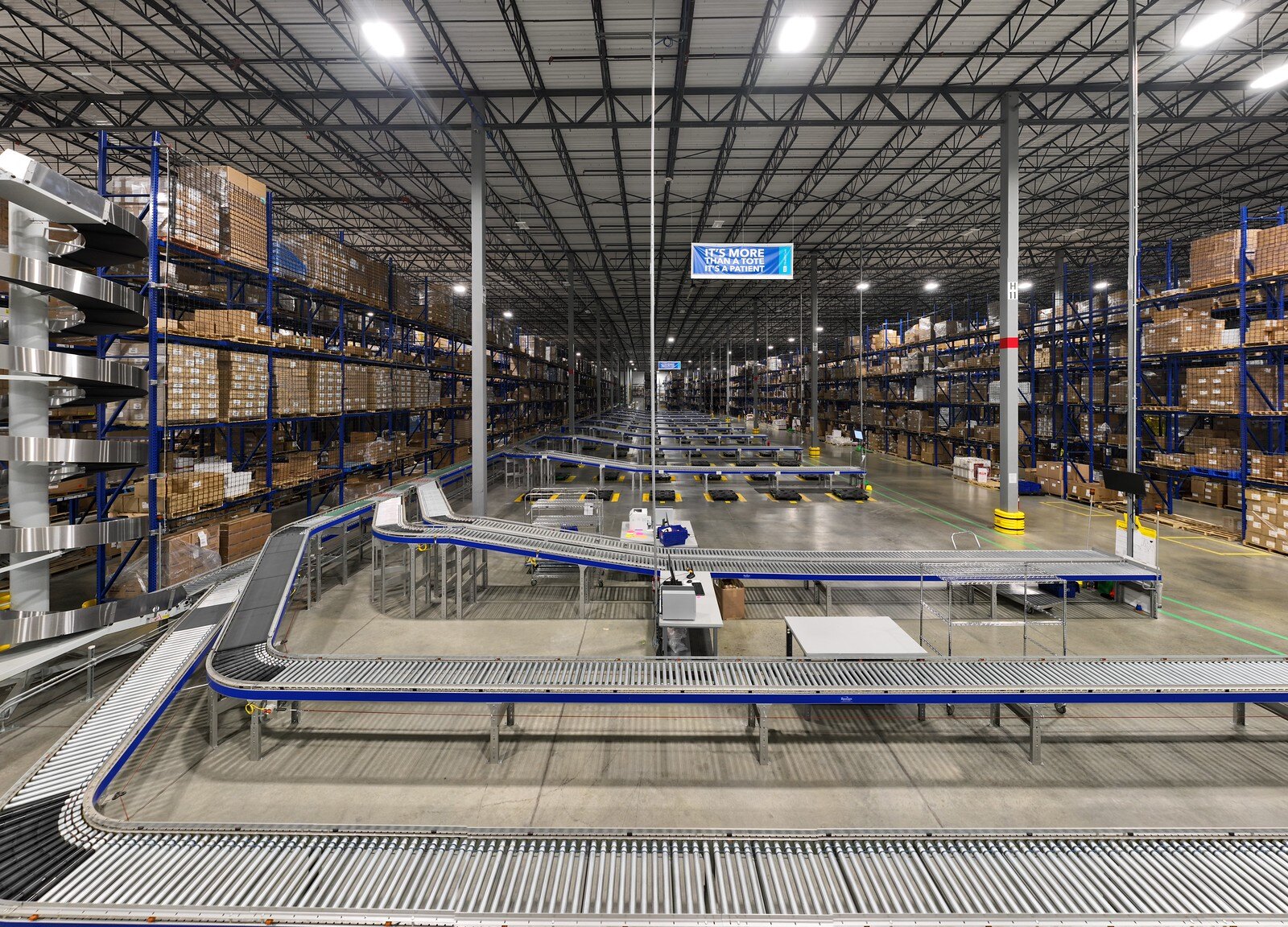 Organised warehouse interior with a conveyor system